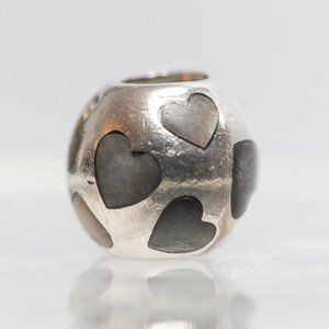 Retired genuine Pandora hearts charm with stone
